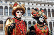 The masked couple in San Marco in Venice for the days of Mardi gras  and the Carnival