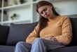 © nsit0108 - Sad woman pain menstruation abdomen. Sorrow solitude upset female. Generate AI