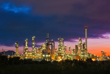 Oil​ refinery​ and​ plant and tower of Petrochemistry industry in oil​ and​ gas​ ​industry with​ cloud​ blue​ ​sky the morning​