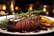 Filet mignon on a plate (Beef fillet served with a choice of pepper or mushroom sauce).