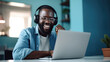 © Studio Nova - A man in a casual outfit works on a laptop in his office