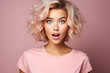 © Gonzalo - Portrait of impressed speechless young girl open mouth staring cant believe isolated on pink background