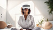Portrait of happy smiling passionate african american dark skinned curly woman girl person wearing virtual reality headset in white room.