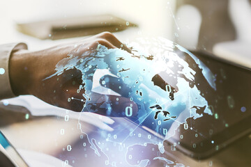 Wall Mural - multi exposure of abstract graphic coding sketch with world map and hand working with a digital tabl