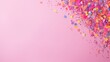 Pink background for text with confetti and colored sparkles.