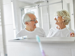 Wall Mural - woman tooth bathroom toothbrush hygiene senior morning routine brushing toothpaste care dental elder