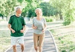 © Lumos sp - outdoor senior fitness woman man lifestyle active sport exercise healthy fit couple running jogging elderly mature having fun laughing talking together friend hug break