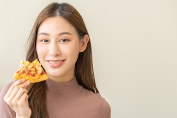 Wall Mural - Happy meal with fast food, pleasure asian young woman, girl hold piece, enjoy eating delicious slice of pizza having takeaway at home relaxing resting, like taste good appetite, snack in lunch, dinner