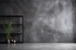 A dark, matte gray epoxy wall texture with a subtle, industrial vibe