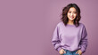 © Ari - An Asian woman wearing purple sweatshirt isolated on pastel background