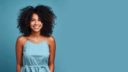 Wall Mural - Afro-american woman model wearing a blue sundress isolated on pastel