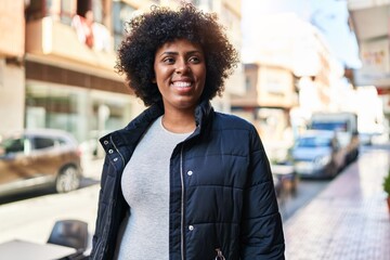 Poster - African american woman smiling confident looking to the side at street