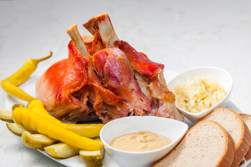 Wall Mural - roasted pork knee with picked vegetables, bread and mustard