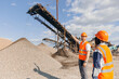 Industrial construction site, belt conveyor on open pit mine. Industry team Workers engineers background sand quarry