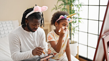 Sticker - African american father and daughter wearing funny diadem applying makeup looking on mirror at bedroom