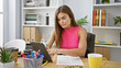 © Krakenimages.com - Young beautiful hispanic woman business worker using touchpad at the office