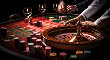 players spin roule on a roulette table using cards and chip