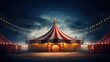 red and yellow circus tent at night with lights