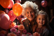 Kolorowe chwile z babcią - ujęcie pełne miłości, balonów i uśmiechów.