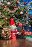 Fototapeta Kwiaty - Wonderful presents under beautifully decorated christmas tree