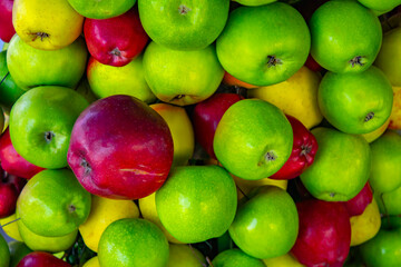 Wall Mural - Red and green apples. Background of ripe apples.