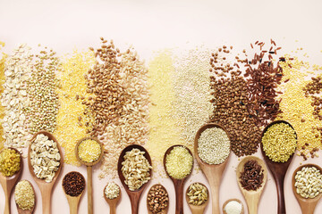 Wall Mural - Colorful mix of grain varieties: oat and wheat, rice and millet, buckwheat and barley, quinoa and polenta. Food ingridients background