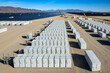 © The Desert Photo - Aerial view of solar power and battery storage units in the desert