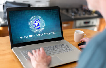 Wall Mural - Fingerprint security system concept on a laptop