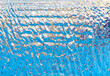 Splashes of water from a fountain as an abstract background