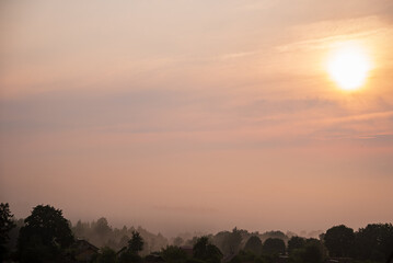 Sticker - Sunset over a field  in country