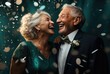 an elderly couple laughing, hugging and bouncing confetti