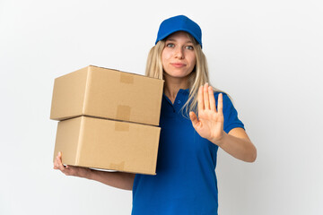 Poster - ¬°Young delivery woman isolated on white background making stop gesture