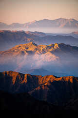 picturesque landscape of the asir mountains at sunrise, saudi arabia.