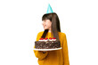 © luismolinero - Little girl holding birthday cake over isolated chroma key background looking side