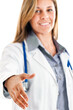 © Minerva Studio - Smiling female doctor offering handshake