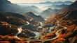 A tranquil journey awaits as the winding road leads through a majestic valley, surrounded by towering mountains and a flowing river at the break of dawn