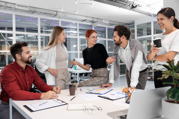 Sticker - Team of employees working together in office