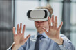 © Katsiaryna - businessman in virtual reality headset in the office