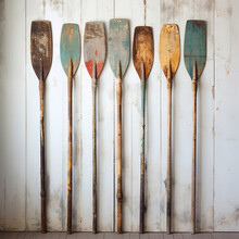 Illustration Of Wooden Oars Painted In Vintage Style. Canoe Paddles Lined Up Against An Old Wooden Background. Natural Wood Canoe Paddles.