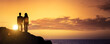 Sihouette eines Mannes und einer Frau auf einer Klippe bei Sonnenuntergang