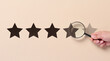 Five star rating and a magnifying glass in a woman's hand. Customer reviews