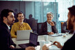 © Davor - Business people having meeting in modern office conference room