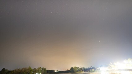 Wall Mural - A milkyway star at nigh sky with cloudy on mountain view located at thailand