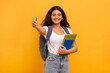 © Prostock-studio - Cheerful young indian woman student showing thumb up