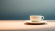  a white coffee cup sitting on top of a white saucer on a saucer on top of a saucer on top of a wooden table with a blue wall in the background.
