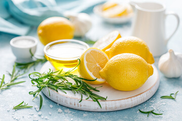 Wall Mural - Lemon, rosemary, garlic and olive oil. Ingredients for mediterranean cuisine cooking