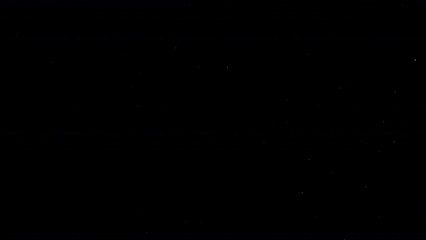 Wall Mural - Dust Particles Floating On Black Background. Dynamic Dust Particles Randomly Float In Space. Glittering Dust Particles With Bokeh on 4K Slow motion.