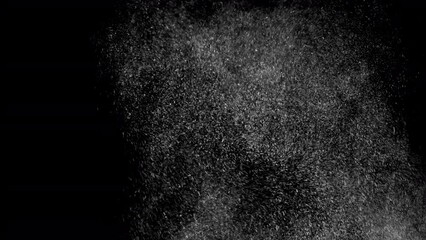 Wall Mural - Huge falling VFX dust particles Floating On Black Background. Dynamic Dust Particles Randomly Float In Space. Shimmering Glittering Dust Particles