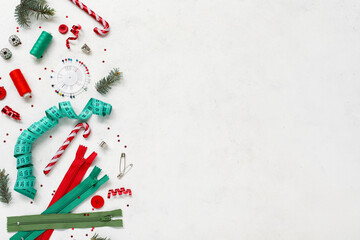 Sticker - Composition with sewing accessories and Christmas decorations on light background