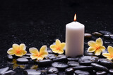 Fototapeta Panele - beautiful spa setting of four frangipani 
 ,candle zen,basalt stones, closeup, spa concept
